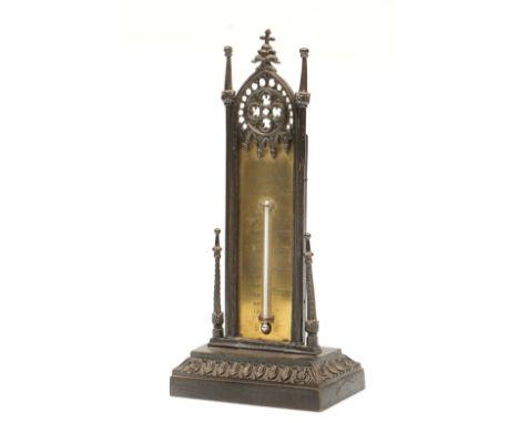 A 19TH CENTURY PATINATED AND LACQUERED BRASS DESK THERMOMETER, of pierced Gothic arch form, the back impressed Pubd by T C Sa