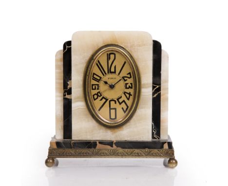 AN ART DECO ONYX AND MARBLE MANTEL TIMEPIECE, with oval gilt dial, the case of rounded rectangular stepped form, on gilt meta