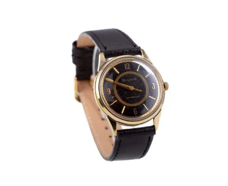 GENTLEMAN'S BULOVA GOLD PLATED MANUAL WIND WRIST WATCH,the round black dial with applied baton and Arabic hour markers, outer