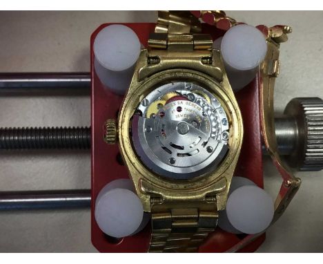 LADY'S ROLEX OYSTER PERPETUAL DATEJUST EIGHTEEN CARAT GOLD AUTOMATIC WRIST WATCH,model number 79158, serial number P904688, t