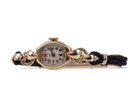 LADY'S TUDOR ROLLED GOLD MANUAL WIND WRIST WATCH,the tonneau white dial with Arabic hour markers, outer railroad seconds trac