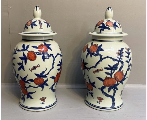 TEMPLE JARS, pair, 42cm H x 22cm diam., glazed ceramic with design after one seen in the Ashmolean collection. (2) 