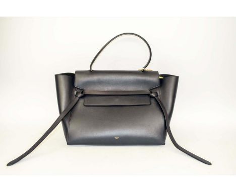 CELINE MINI BELT BAG, iconic trapeze design, top single handle, flap tucked into a leather strap closure, top zip closure, co