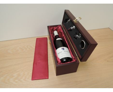 A bottle of Saint-Romain 2004 Vin De Bourgogne Appellation Saint-Romain Controlee Thibault-Fevre 13% vol 750ml, in fitted dis