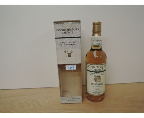 A bottle of Gordon &amp; Macphail Connoisseurs Choice Speyside Single Malt Scotch Whisky, Strathmill 10 Year Old,  distilled 