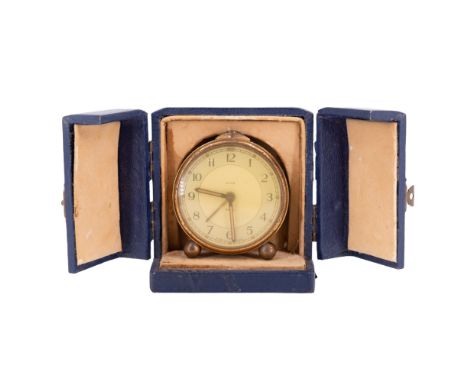 A 1930s Smith's travel alarm clock in fitted case, clock 7 cm, (running when catalogued, accuracy and reliability un-tested)