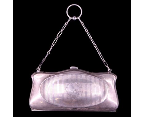 A George V silver ring purse having linear engine-turned decoration and a calf interior, Birmingham, 1915, 114 g