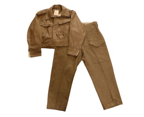 A Second World War South African Army Battledress blouse and trousers, labelled and dated