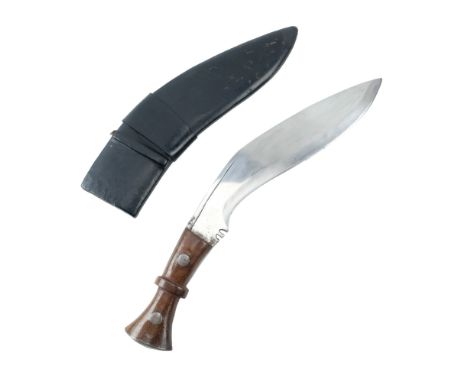 A British / Indian military pattern kukri, its grip scales secured to the tang by means of steel rivets, in black leather cov