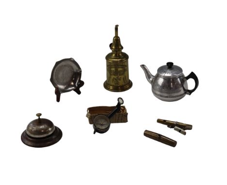 Sundry small collectables comprising a brass "Pigeon Lampe Merveilleuse", a countertop bell, a Festival of Britain bachelor t
