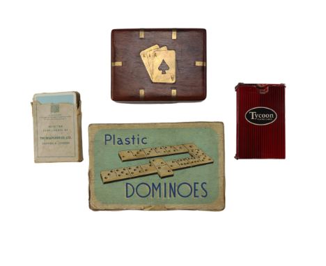 A brass-mounted playing card box together with a Pan Am and two other vintage card decks and a set of plastic dominoes