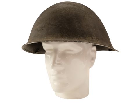 A 1945 dated British Army Mk IV steel helmet