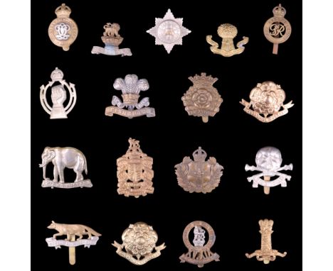  A group of British Army cavalry and yeomanry cap badges etc