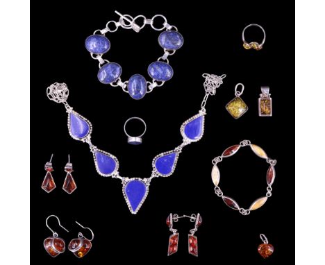 A quantity of white metal and similar mounted lapis lazuli and sun-spangled amber jewellery including heart-shaped ear pendan