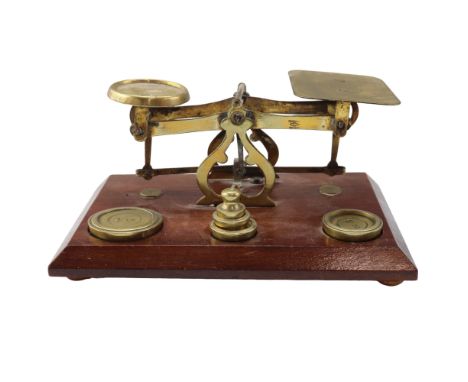 A set of Victorian "Criterion" postal / letter scales and weights, in brass and mahogany, 19 cm x 13 cm
