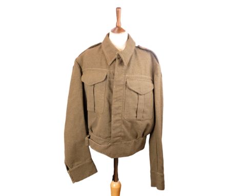 A 1941 New Zealand Battledress Blouse, that of a captain of 1st Armoured Division / 2nd Armoured Brigade Motorised Infantry 
