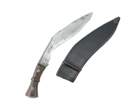 A 1945 dated British / Indian military issue kukri, its blade stamped "HW 45", in 1945 dated scabbard, 46 cm overall