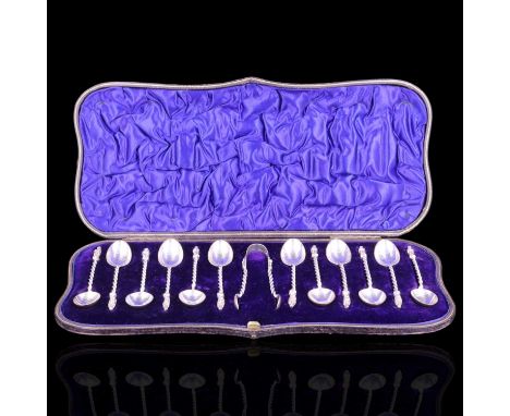 A Victorian cased set of twelve silver apostle teaspoons with sugar tongs, William Hutton and Sons, London, 1898, 170g
