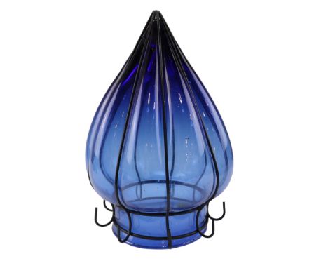 A blue glass and wrought iron lantern of lobbed form, circa late 20th Century, 33 x 24 x 24 cm