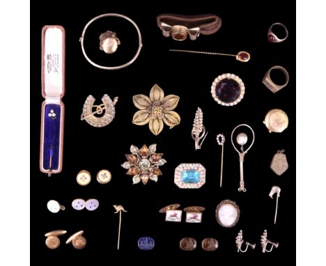 A group of Victorian and later costume jewellery including a filigree flowerhead brooch, stick pins, a shell cameo pendant br