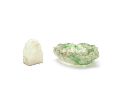 A JADEITE WASHER AND A JADE SEALQing DynastyThe washer naturalistically carved as a lotus leaf, the interior and exterior fin