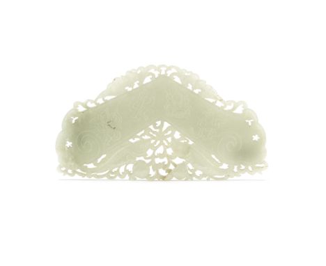 A CARVED JADE 'BUDDHIST EMBLEMS' CHIME, HUANG19th centuryThe v-shaped chime incised with four emblems on each side, below two
