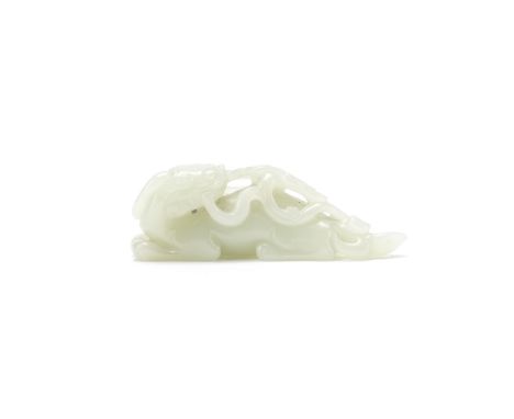 A PALE CELADON JADE 'LUDUAN' CARVING18th/19th centuryRecumbent with the legs tucked beneath, the head turned back with a spra