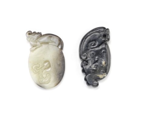 TWO JADE CARVINGSMing Dynasty or laterComprising: an archaistic black jade dragon carving; and a bi disc supporting a luduan 