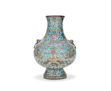 A LARGE CLOISONNÉ ENAMEL 'DRAGONS' VASE, HU17th centuryThe bulbous body flanked by two lion heads handles and enamelled on ea
