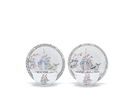 A PAIR OF GRISAILLE AND FAMILLE ROSE CUPS AND SAUCERSYongzhengEach with the saucer depicting two scholars and an attendant in
