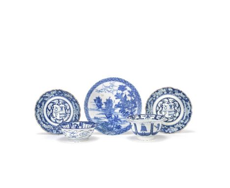 A GROUP OF JAPANESE BLUE AND WHITE WARESEdo to Meiji periodComprising: a pair of Arita blue and white armorial dishes with ba