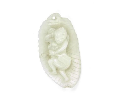 A WHITE JADE CARVING OF A LADY ON A LEAF19th centuryThe lady carved in the nude on her side, a fan held in the left hand, sup