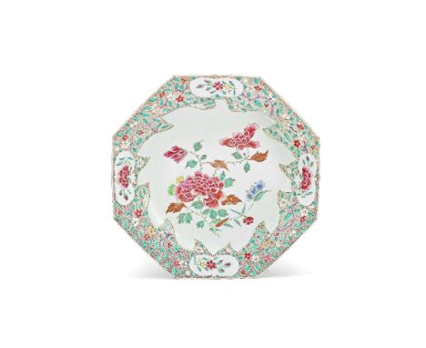 A FAMILLE ROSE OCTAGONAL CHARGERYongzhengDecorated with a large leaf shaped panel reserved with flowering peony stems, on a w