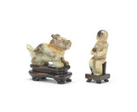 A JADE FIGURE AND JADE LUDUANMing Dynasty or laterThe figure seated with a bi disc held to his chest; the beast seated on its