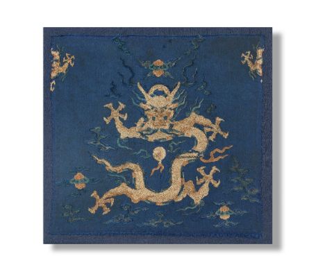 A BLUE-GROUND SILK EMBROIDERED 'DRAGON' PANEL18th centuryOf square shape, finely embroidered with a ferocious front-facing fo