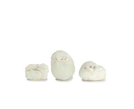 THREE JADE 'BIRDS' CARVINGSMing Dynasty or laterComprising: a small carving of a duck carrying a sprig of millet in the mouth