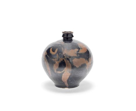 A BLACK-GLAZED RUSSET-SPLASHED CIZHOU JARJin DynastyThe compressed body surmounted by a tapering neck recessed just above the
