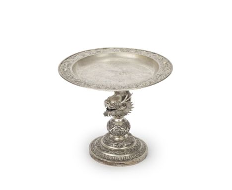 A CHINESE EXPORT SILVER 'DRAGON' TAZZAEarly 20th Century, marked TC, TUCK CHANGThe circular raised bowl engraved with a five-