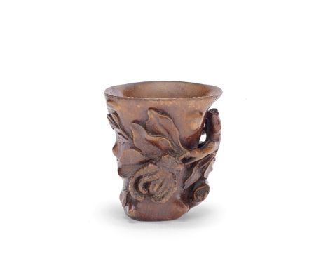 A CARVED BAMBOO 'FINGER CITRON' CUP19th centuryOf naturalistic form modelled as a knotted trunk carved in relief with a gnarl