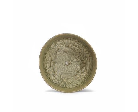 A MOULDED YAOZHOU 'CRANES' BOWLNorthern Song DynastyWith slightly rounded conical sides rising from a narrow foot, the interi