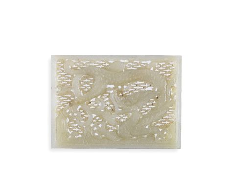 A CARVED AND PIERCED PALE CELADON JADE 'DRAGON' PLAQUEMing DynastyOf rectangular form, carved and pierced with a coiled drago