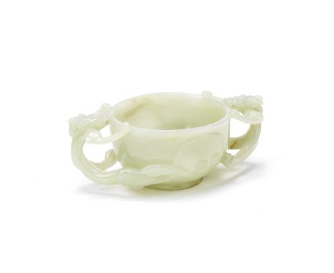 A PALE CELADON JADE 'CHILONG' DOUBLE HANDLED CUPMing DynastyThe well-hollowed cup with deep rounded sides, each handle formed