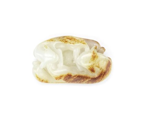 A WHITE JADE 'DOUBLE BADGERS' CARVING18th centuryThe two frolicking badgers carved head to tail, their bodies mirroring and t