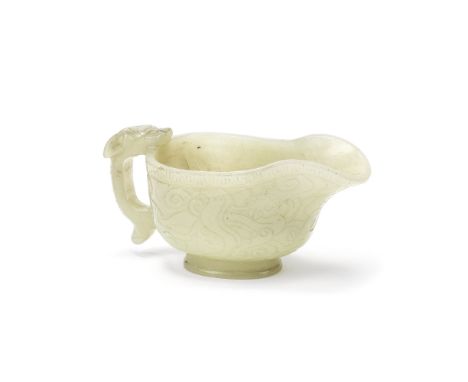 A PALE CELADON JADE 'CHILONG' POURING VESSEL, YIMing DynastyThe rounded body of oval section on a matching foot and rising to