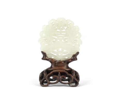 A WHITE JADE 'FISH AND KNOT' PLAQUE18th/19th centuryCarved and pierced to depict a pair of catfish flanking a decorative knot