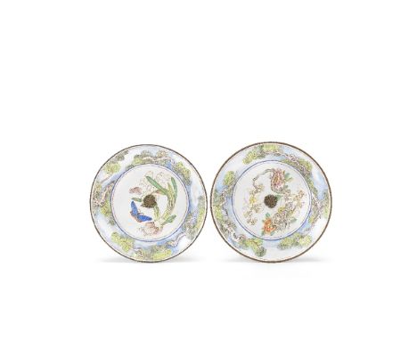 A PAIR OF PAINTED ENAMEL SAUCERSQianlongEach finely decorated with a border of pine branches set against a pale blue sky, the