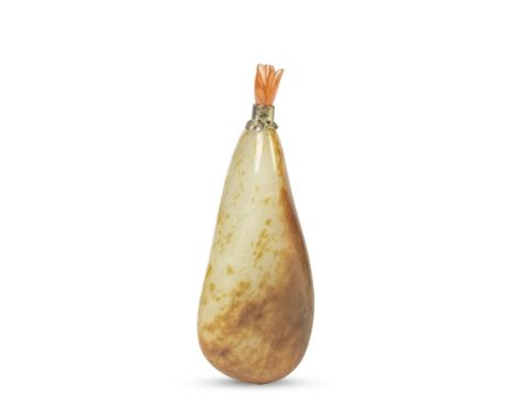 A RUSSET AND WHITE JADE 'PEBBLE' SNUFF BOTTLE19th centuryThe irregular pebble of elongated tapering form, carved through the 