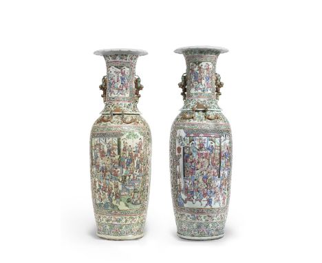 A PAIR OF MASSIVE FAMILLE ROSE VASES19th centuryEach of baluster form beneath a foliate rim, painted in mirror image, the bod