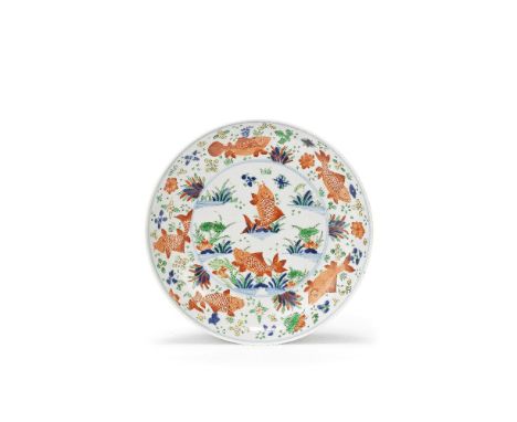 A WUCAI 'CARP' DISHMid-Qing DynastyThe interior with a central roundel enclosing two iron-red carp, one leaping from the wate
