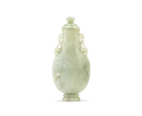 A PALE CELADON JADE VASE AND COVER20th centuryThe compressed rounded body supported on a banded foot, incised on each side wi